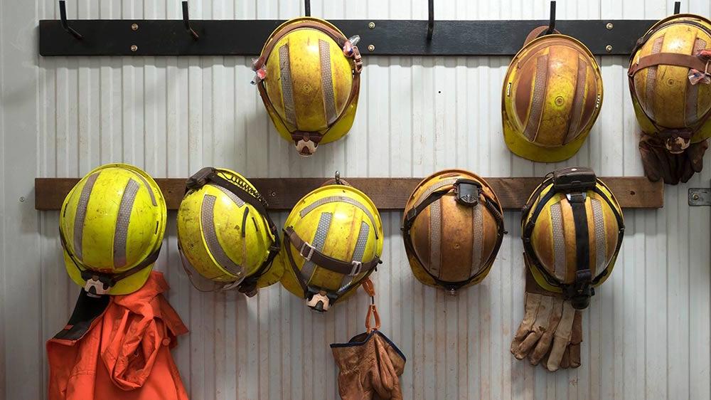 Safety equipment hanging on a wall.